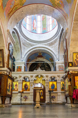 Motsameta monastery inside view of the main nave and altar with iconostasis, columns and dome, Georgia.