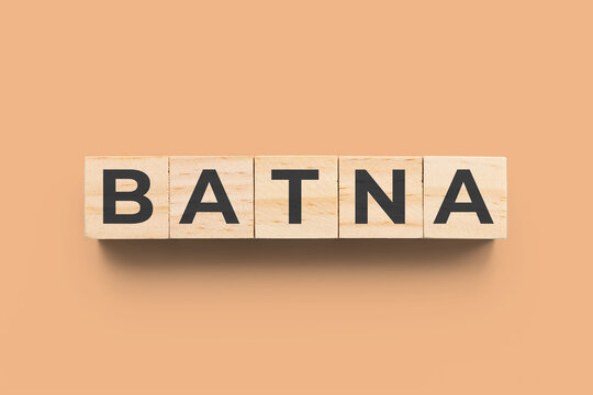BATNA (Best Alternative to a Negotiated Agreement) wooden cubes orange background