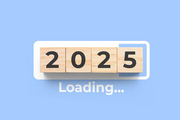 2025 wooden cubes on blue background with loading bar