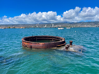 Pearl Harbor, September 8, 2023: Pearl Harbor Memorial Park looking at the Exposed Turret of the USS Arizona from the Memorial. (All Proceeds Donated to Homeless.)