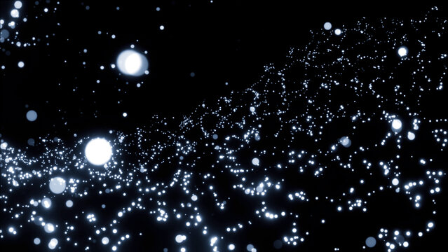 Flying round shaped particles on a black background. Motion. Beautiful spheres in outer space, glowing balls.