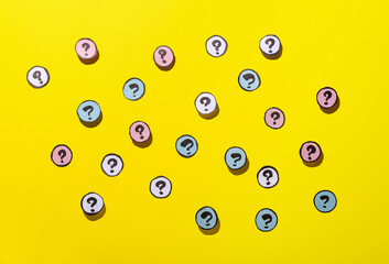Different question marks on yellow background