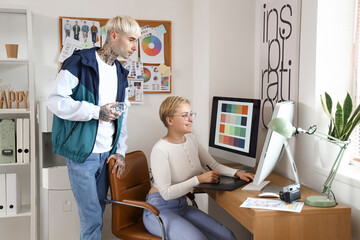 Graphic designers working in office