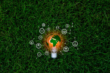 Green energy concept. light bulb on grass nature, eco green energy system. Innovation technology eco energy. light bulb energy sources for renewable. Concept innovation inspiration. Idea innovative..