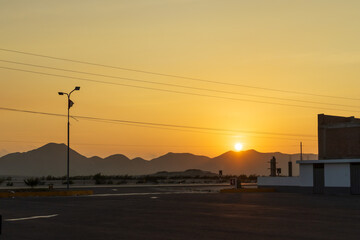 Beautiful sunset over the hills, as seen from the highway.