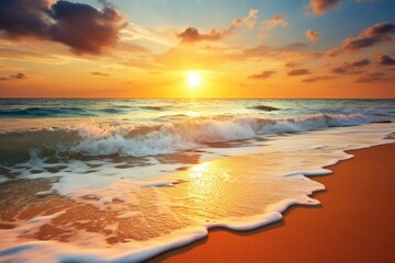 Sunset or sunrise scene Along the beach, there are thin waves, and the orange light gives a warm feeling.