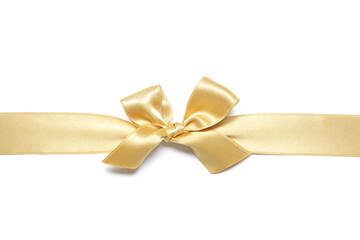 Bow made from golden satin ribbon on white background