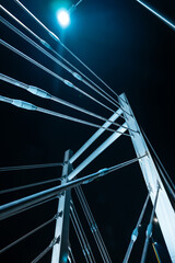 modern metal cable bridge Kaczorowskiego at night, abstract geometry, Lubln - obrazy, fototapety, plakaty