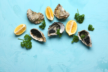 Tasty oysters with lemon and black caviar on blue background
