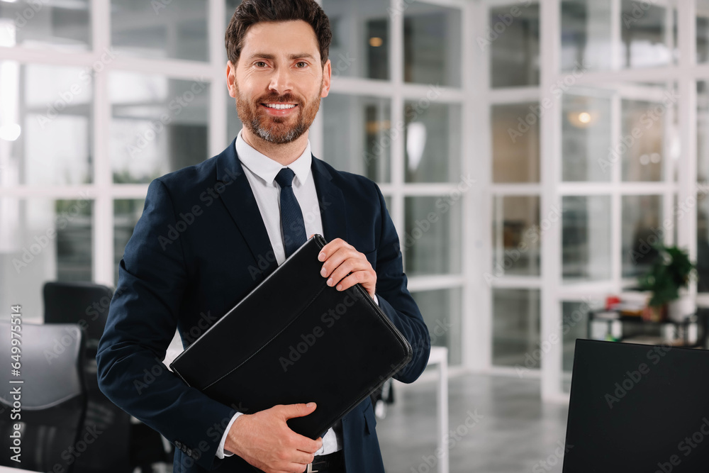 Wall mural happy real estate agent with leather portfolio indoors. space for text