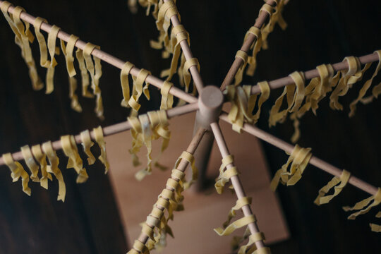 drying homemade pasta - Powered by Adobe