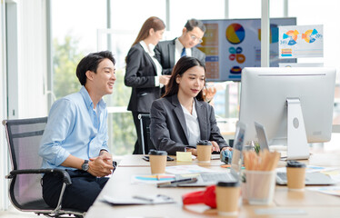 Asian professional successful male businessman mentor supervisor in casual outfit sitting smiling...
