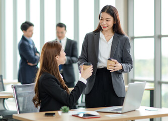 Asian professional successful female businesswoman supervisor mentor in formal suit standing,...