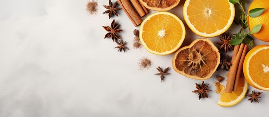 Dried orange slices cinnamon anise and lemongrass on light background Benefits include health skincare haircare anti aging and stress reduction