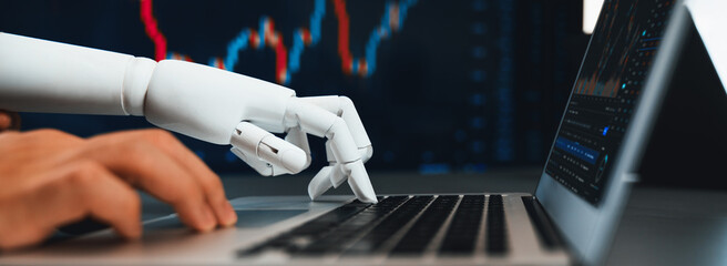 Automated stock trading concept. Robotic and human hand analyzing financial data on stock exchange, artificial intelligence utilization to predict precise price change in stock market. Trailblazing - obrazy, fototapety, plakaty