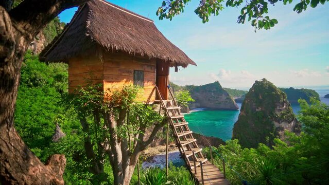 Nature landscape tropical beach with scenery wooden hut on nature background Asia 4K