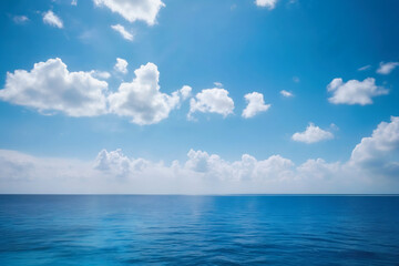 Fototapeta premium Blue sky with white clouds over the sea. Summer vacation background.