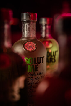 absolut brand vodka bottles. selective focus.