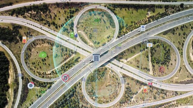 Intelligent Vehicles Cars Communicating Ai Logistic Autonomous Delivery Vehicles IoT GPS Tracking Satellite 5G Smart Roads Traffic Road Junction Interchange Motorway Triangulation Of Traffic Data