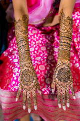 Indian Hindu bride's henna mehendi mehndi hands close up