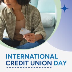Composite of international credit union day text and biracial woman holding credit card