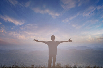 Happy man rise hand on morning view. Christian inspire praise God on good friday background. Now one man self confidence on peak open arms enjoying nature the sun concept world wisdom fun hope.