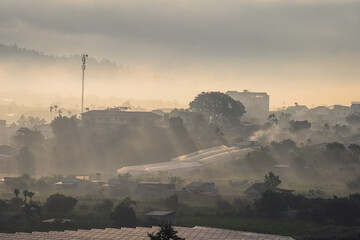 Southern landscape of Lam Ha, Lam Dong with mist and rays
