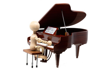 Wooden figure play black mini piano with white background