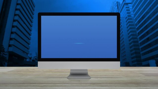 Download icon on desktop modern computer monitor screen on wooden table over office city tower and skyscraper, Technology internet online concept