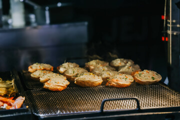 Grilled crab with cheese at Dongmun Market in Jeju Island, South Korea. This market is one of Jeju...