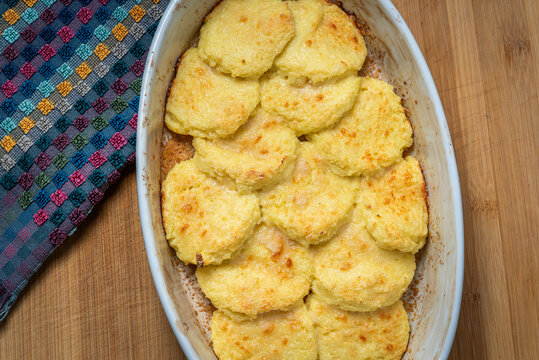 Cooking and Serving Gnocchi alla Romana