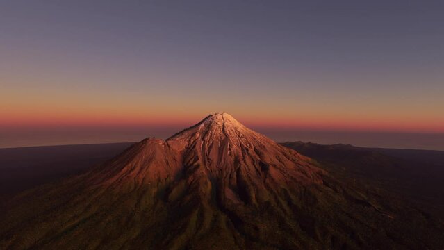 Circular aerial view at sunset of Egmont National Park on the North Island in New Zealand