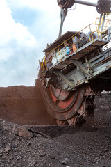 Giant bucket wheel excavator in coal mine - 650095570