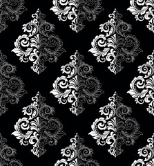 Wallpaper in the style of Baroque. Seamless vector background. White and black floral ornament. Graphic pattern for fabric, wallpaper, packaging. Ornate Damask flower ornament