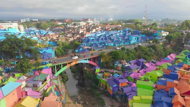Flying over jodipan rainbow village at Malang Indonesia, aerial