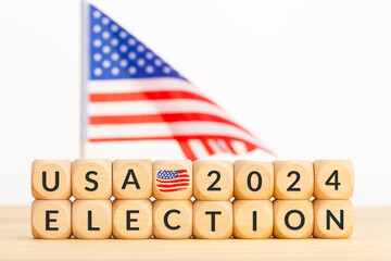 USA 2024 presidential election concept. Wooden block with text and american flag