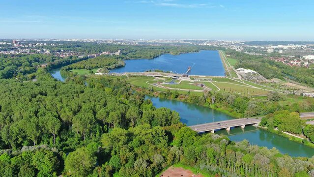 Torcy, France: Aerial view of lake Lac de Vaires-sur-Marne, sunny summer day with clear blue sky - landscape panorama of Europe from above
