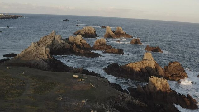 Sunrise in Ouessant/Ushant, Bretagne, France. Huge rock formations in the background.