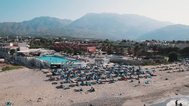 Georgioupoli kavros beach hotel, people enjoying their summer holidays, Greece. High quality 4k footage