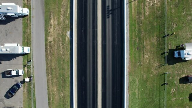 Downward angle drone shot of drag strip race track
