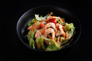 Japanese salad isolated in black background - 650137573