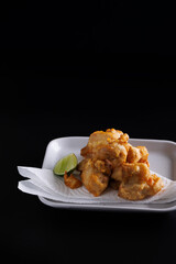 Chicken Karaage Japanese Fried chicken isolated in black background