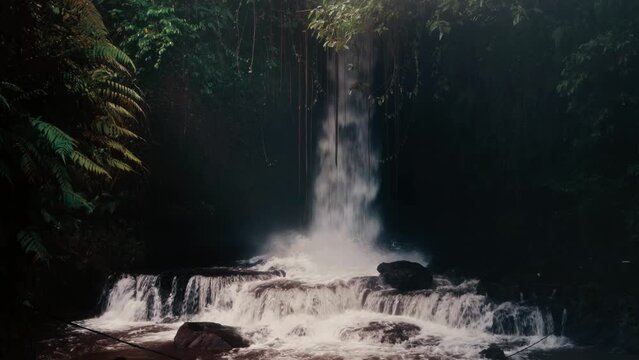 Nature landscape beautiful waterfall in tropical rainforest jungle on nature background 4K