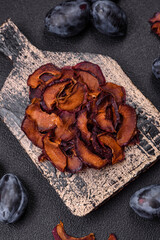 Fresh sweet blue plum sliced and dried