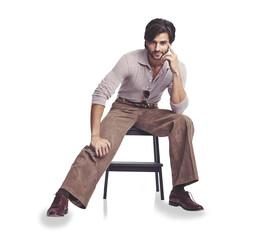 Stylish, portrait and a man with fashion aesthetic, retro and on a chair isolated on a transparent png background. Vintage, trendy and a model or person in hipster or funky clothes with confidence