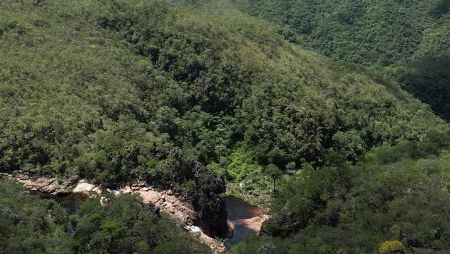 aerial view village in Chapada dos Veadeiros "Aldeia Macaco" hollow-shaped bioconstruction houses cerrado landscape Goi&aacute;s Brazil