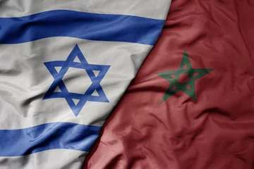 Tuinposter big waving national colorful flag of israel and national flag of morocco . © luzitanija
