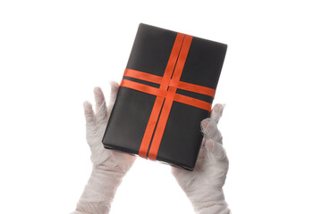 PNG, Gift box in hands in white bandage, isolated on white background