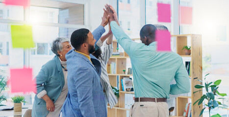Creative people, high five and applause in celebration for team building, achievement or success at...