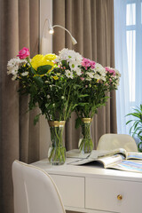Bouquet of flowers in a vase on the table